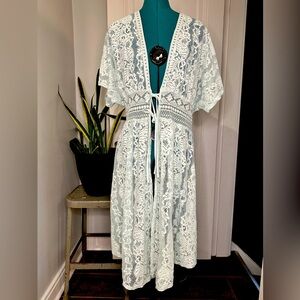 C est. 1946 light aqua blue beach dress size 14/16W
Tie waist festival